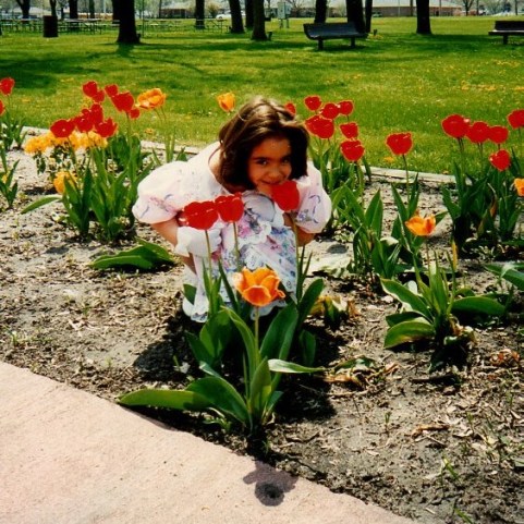 USE audra smelling flowers